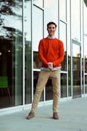 Man in orange sweater